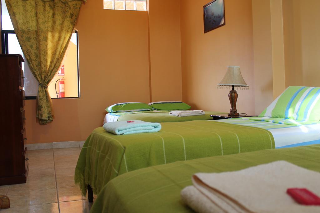 Dolphin House Hotel Puerto Baquerizo Moreno Ruang foto